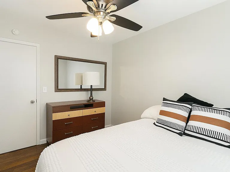 Dresser, lamp, and mirror