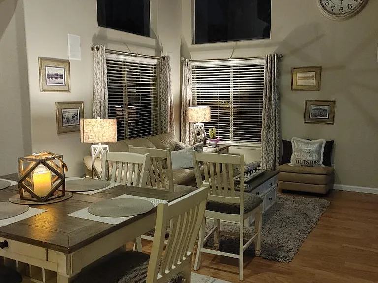 Fully furnished home - High ceilings and open floor plan, vinyl flooring , fireplace, celing fans and wood blinds