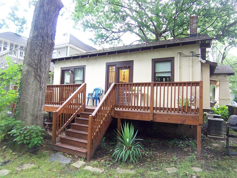 Rear deck under white oak shade tree