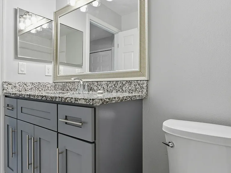 Shared bath with soft close vanity & granite counter top