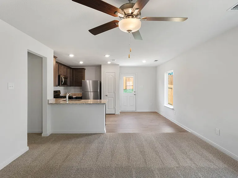 The dining room sits right off of the kitchen.