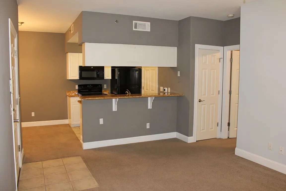 Nicely Appointed First-Floor Condo at The Legends — Photo 4