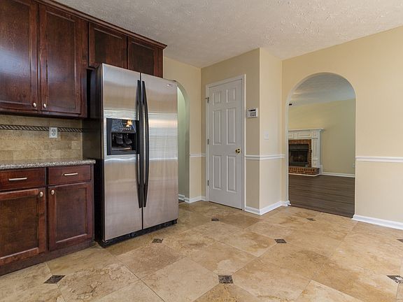 Kitchen w/ Travertine tile