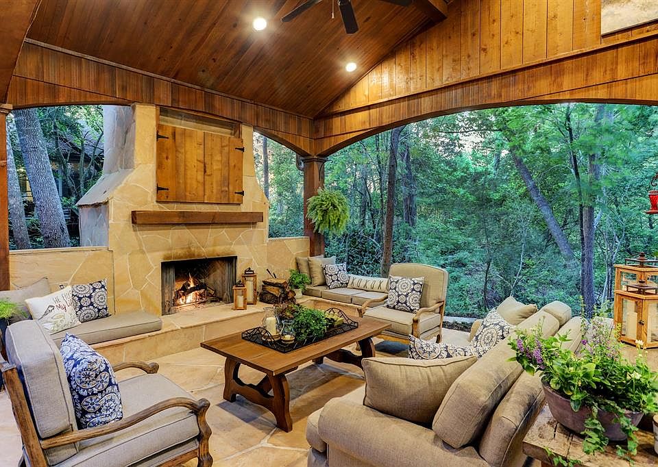 Originally designed by acclaimed architect, Preston Bolton, this home exudes warmth, charm, and serenity. The outdoor Veranda is an amazing feature and offers a cozy wood burning fireplace that is inviting ANY time of the year! This space allows you 