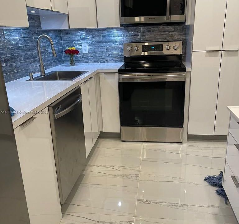 1st image of 2800 N Palm Aire Dr APT 302
