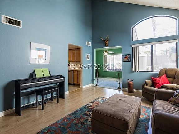 Family room looking towards den at rear and entrance to kitchen on left.