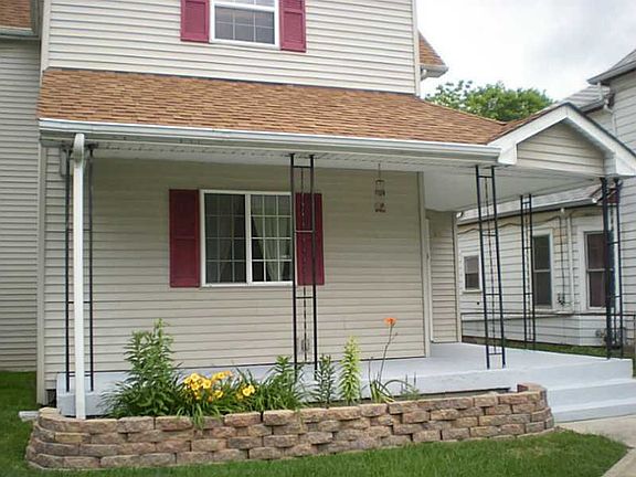 Exterior Front. dimensional roof on home is less than 5 years old.