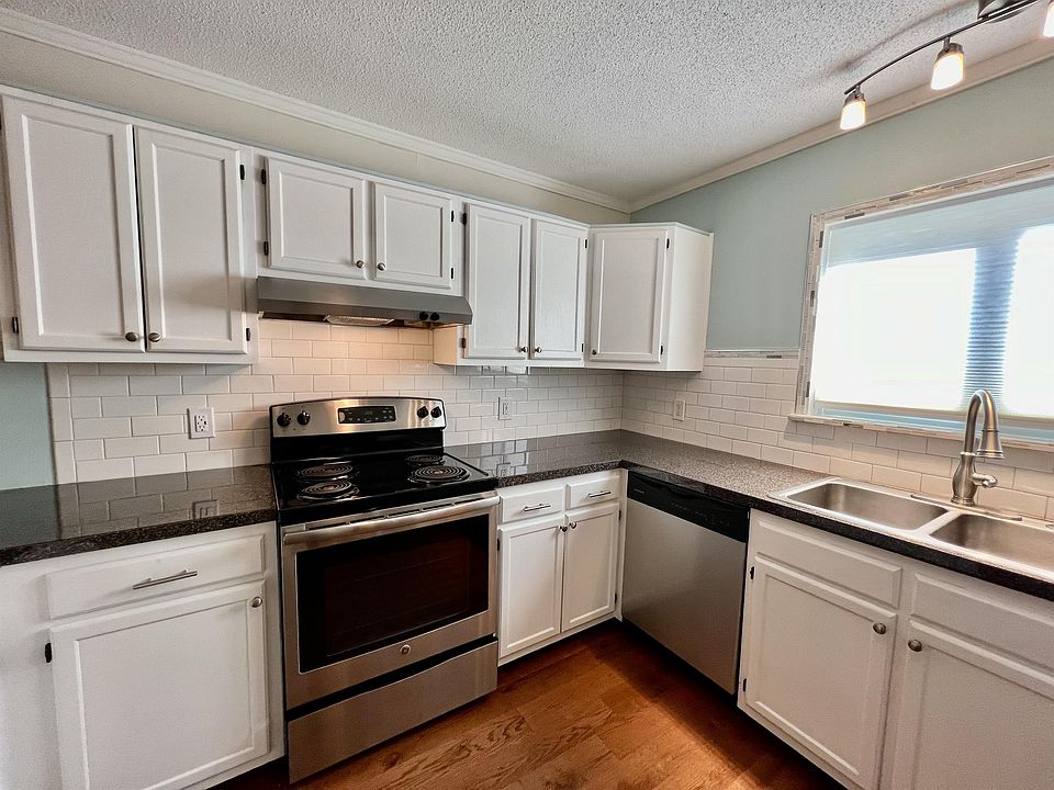 Kitchen with Stainless Steel Appliances and Granite Countertops