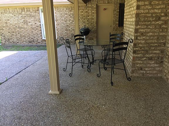 COVERED BACK PATIO AND BBQ