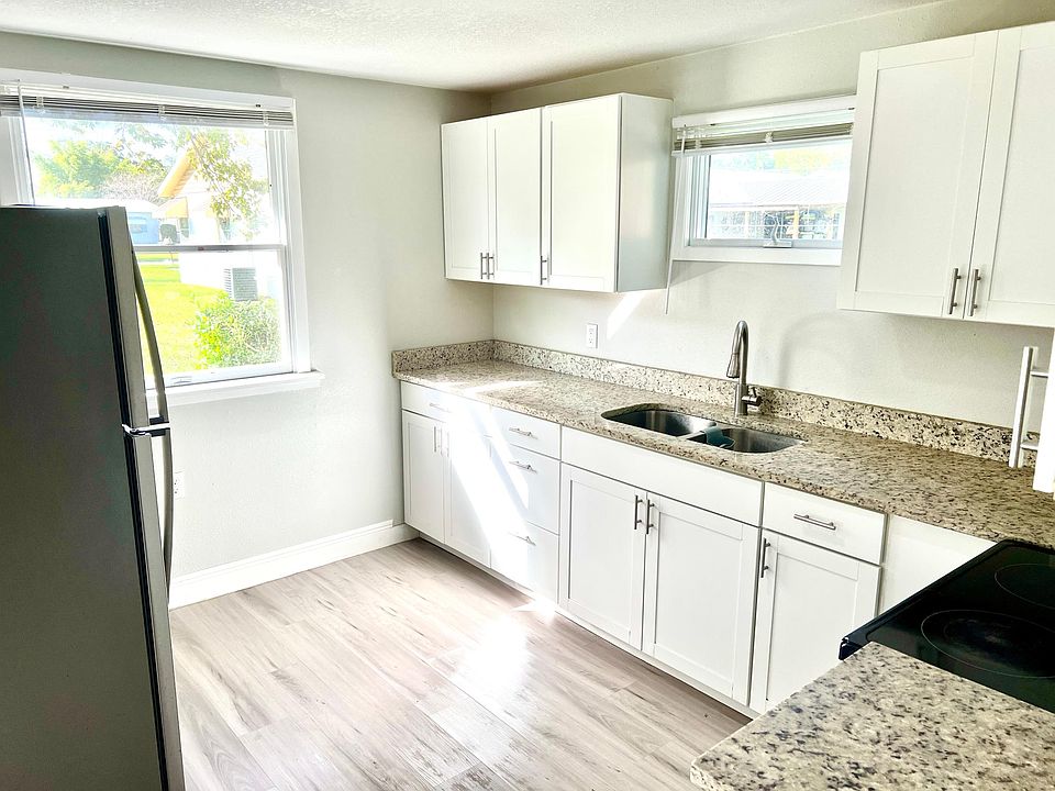 Large recently remodeled kitchen with granite counters, new cabinets, & new appliances