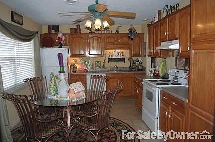 Oak wood cabinets...
						:
						Hall bath has been updated.