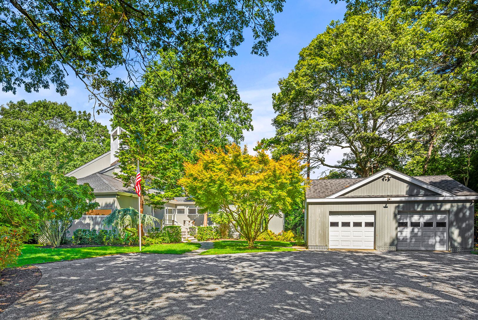  Front of home with two car garage