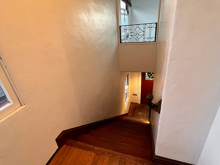 view of front door from second floor landing
