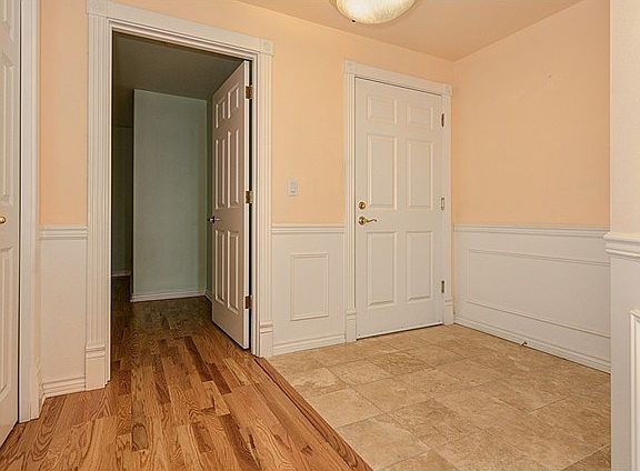 This is the entry. It is nice size and it has a coat closet.