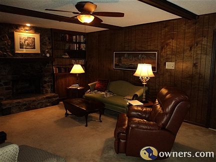 View of den from double glass doors coming in from pool