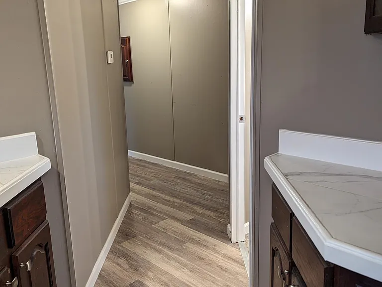 hallway to common bath and bedrooms