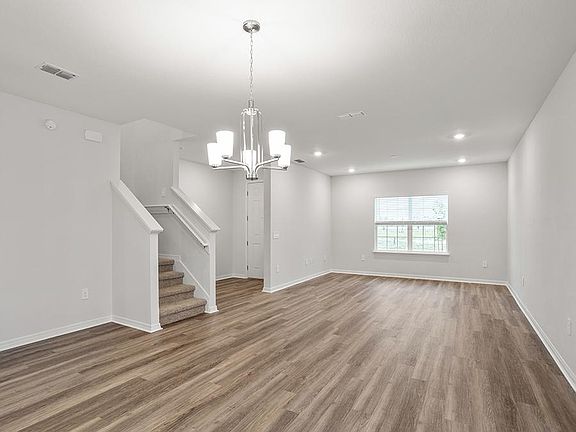 Enjoy a spacious, open living area - Brynn bungalow by Highland Homes