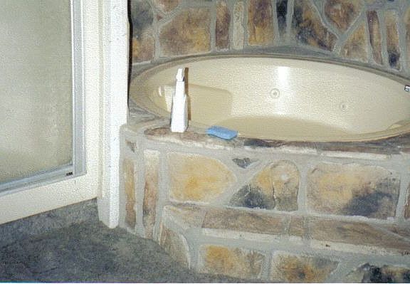 Whirlpool stone tub and separate shower in MasterBath