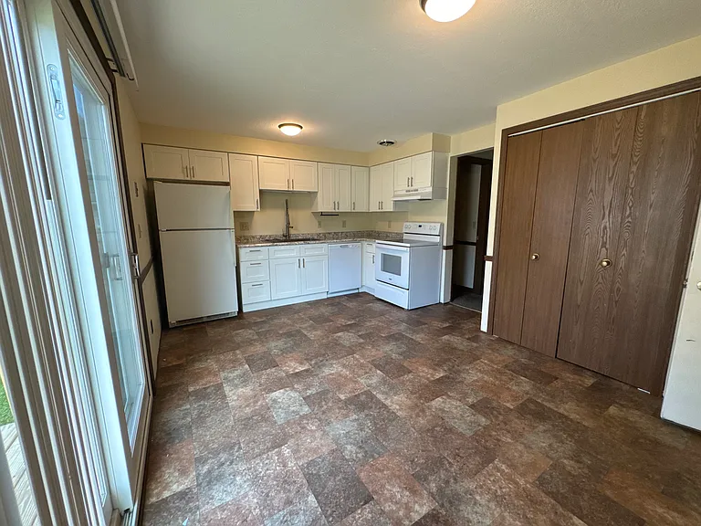 Updated Kitchen with refrgerator, dishwasher and oven. Large pantry