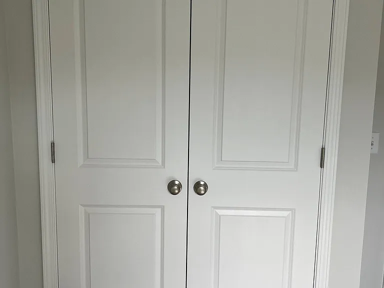 Closet with new washer and dryer on top floor