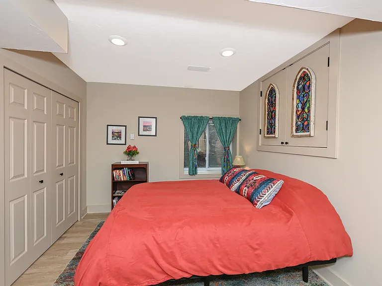 Master BR includes large closet with wire drawers for clothes.
