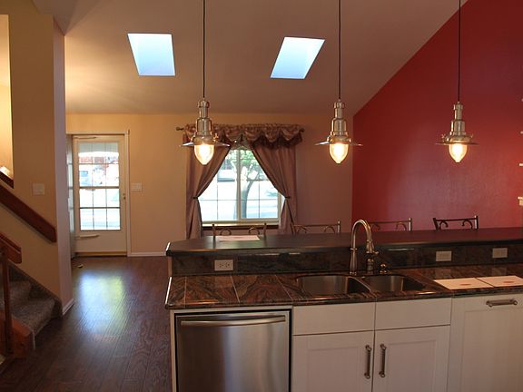 Kitchen opens to living room