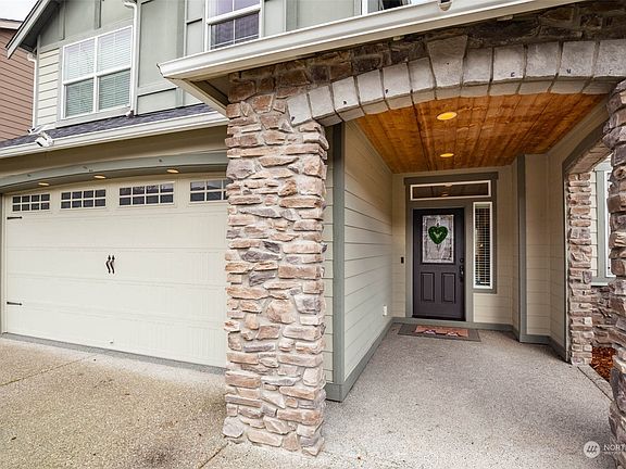 Huge stone-pillar arched entryway>