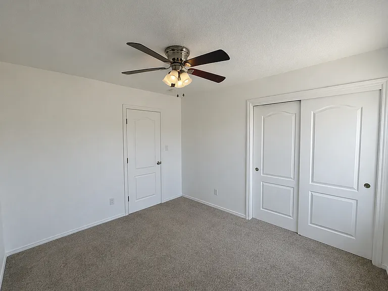 Carpet color and doors may vary from what is shown in photo.