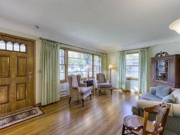 Plenty of sunlight, true hardwood floors in the main floor living room.