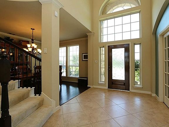 Grand entry opens welcomes your friends and guests into beautiful, spacious rooms.