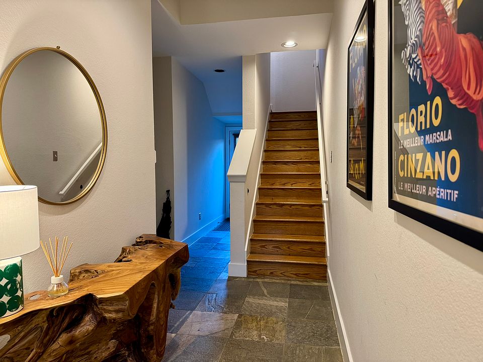 natural slate and real hardwood floors throughout