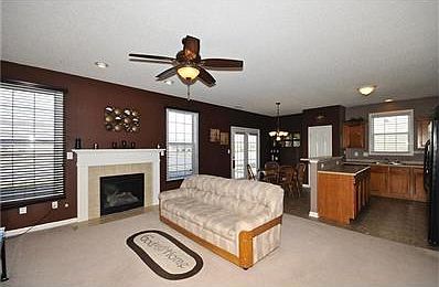Open concept living  Kitchen Breakfast room and Great room with Gas log fireplace. Stunning views on this Pond View lot!