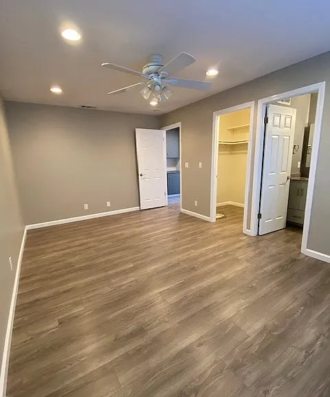 Primary bedroom with walk in closet.