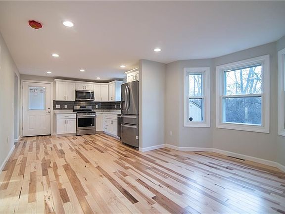 View from back of Large Eat-in-Kitchen to side door out to deck