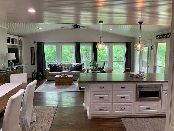 Kitchen opens into sunroom