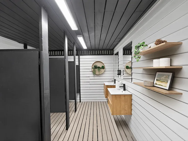 Step into modern elegance at Lake Shore Park Apartments. This stylish bathroom features sleek fixtures and warm wood accents, creating a serene retreat. Ideal for relaxation and convenience. Schedule your tour today!