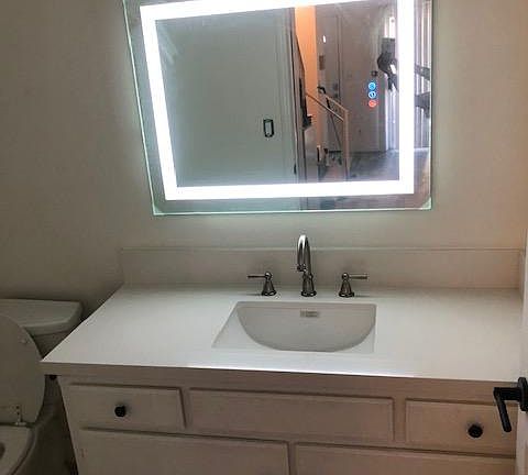 Guest Bathroom on first floor with New LED Mirror, New Quartz Countertop