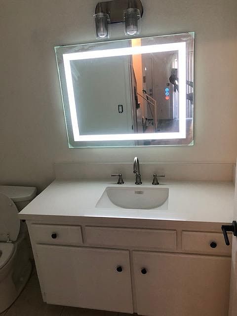 Guest Bathroom on first floor with New LED Mirror, New Quartz Countertop