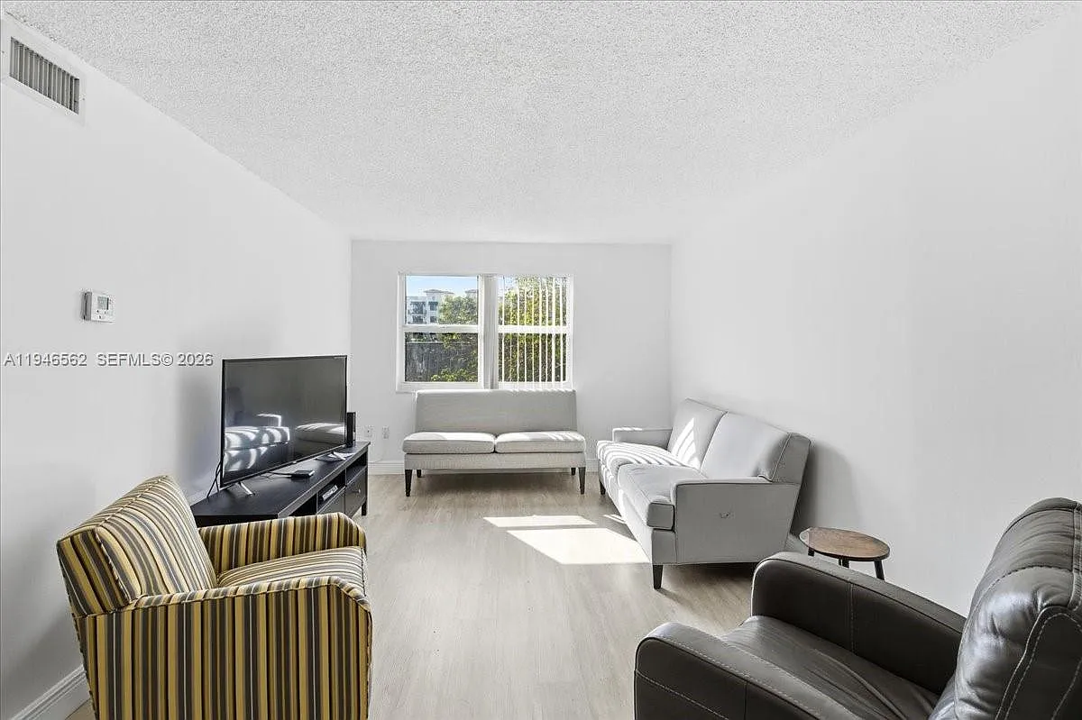 Village Homes & Condos At — Photo 2