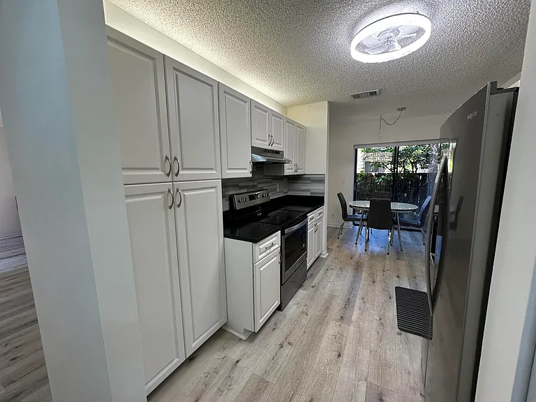 3953 Cocoplum Cir #3611 — Photo 17