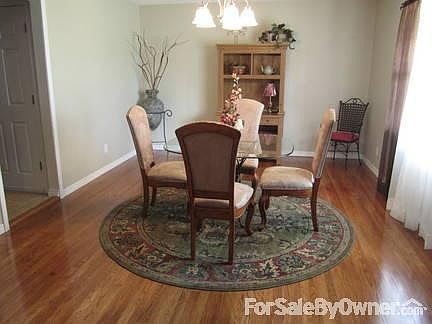Check out those beautiful floors!
						:
						Dining room - opens to foyer and kitchen