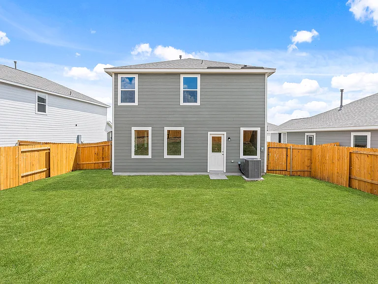 The back yard of the Juniper plan is fully fenced-in.