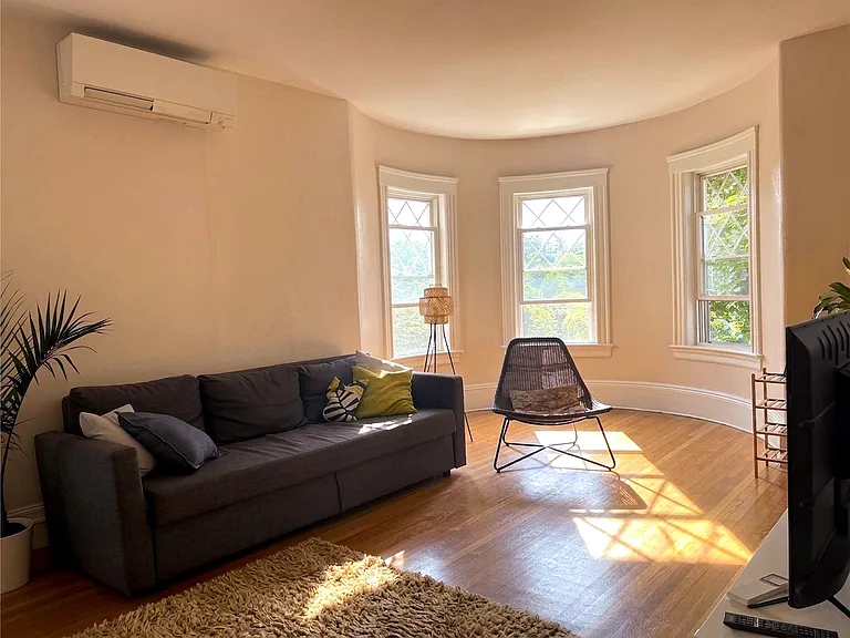 Living Room. Furniture provided upon request.