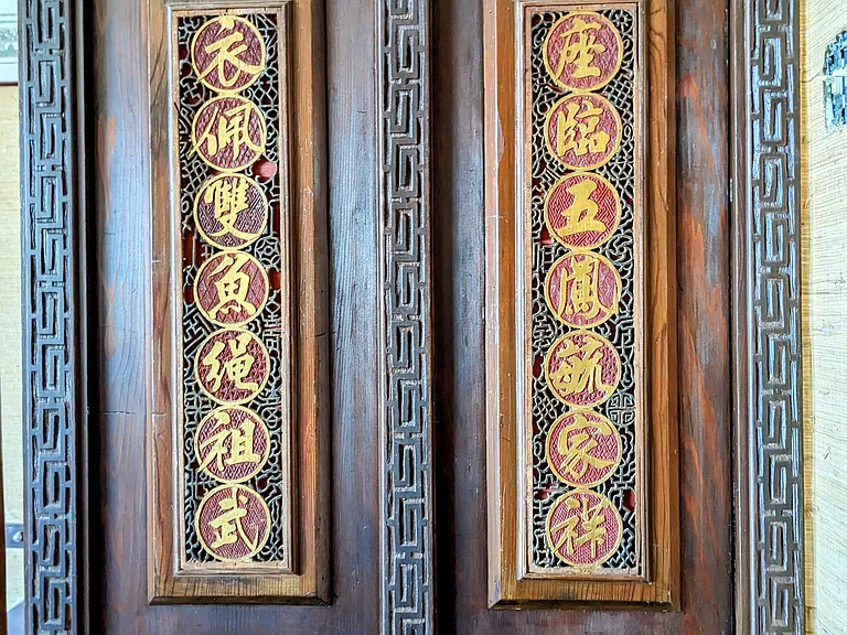 Internal detail, most likely 1917 on the stair case. Our working translation: ""Whatever success we wear, we earned by walking the path our ancestors cleared." "Whatever position we hold, we use to build good fortune for the generations to come."