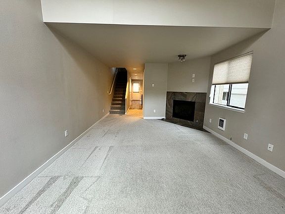 Living Room with Wood Burning Fireplace