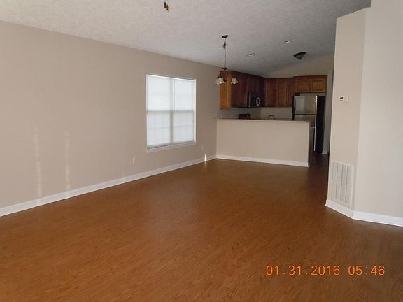 Living room, dining area, kitchen