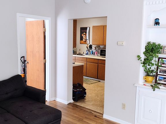 Living room to Bedroom 1 and Kitchen