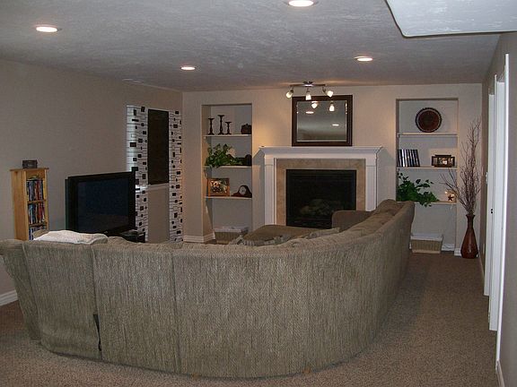 Family room with beautiful built in shelves and gas fireplace