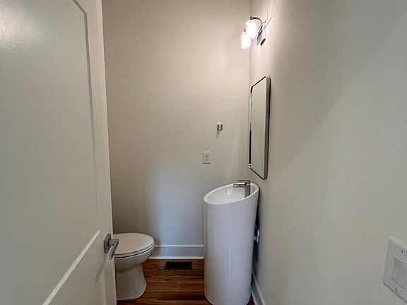 1/2 Bath off kitchen/dining/living room