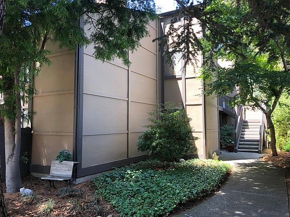 Garden path to unit from auxiliary parking lot